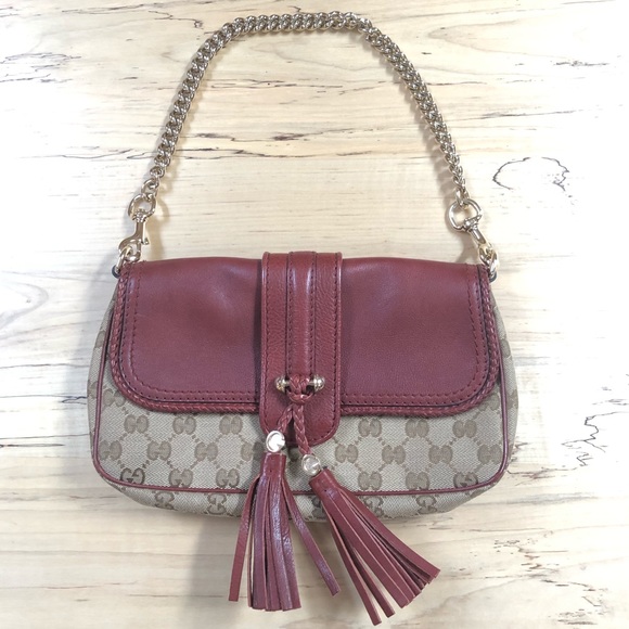 Gucci Handbags - Gucci 🤎 Marrakech burgundy red leather & canvas shoulder bag w/ tassel
